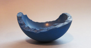 broken blue handball torn in half broken ball